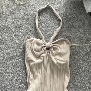 Small beige bodysuit from Zara . NEVER WORN
